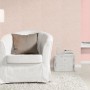 Rosa Vliestapete Uni-Design (Rasch Bambino XIX 252873) im Wohnraum mit Sessel und Lampe.