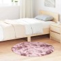 Runder Altrosa Shaggy Hochflorteppich NAVARRA aus Polyester, 100x100 cm, im Schlafzimmer auf Holzfußboden.