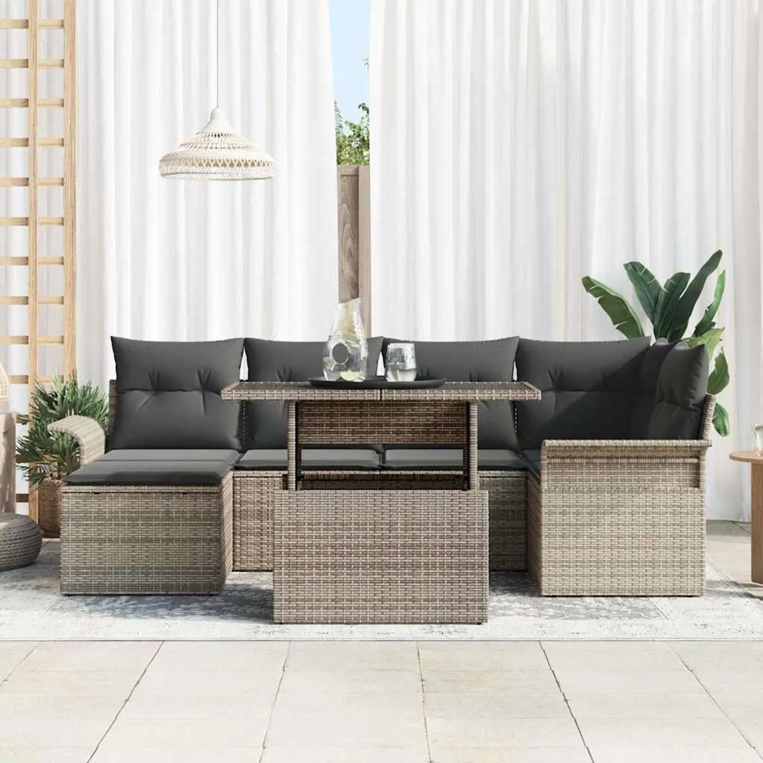 Graues 7-teiliges vidaXL Garten-Sofa-Set aus Poly Rattan mit Kissen.