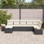 Schwarzes 7-teiliges vidaXL Garten-Sofa-Set aus Poly Rattan mit beigen Kissen.