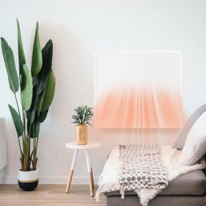 Wiltec Infrarotheizung 290W als Heizpaneel an der Wand im Wohnzimmer.