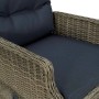 Detailaufnahme: Brauner vidaXL Gartensessel aus Rattan mit schwarzen Auflagen.