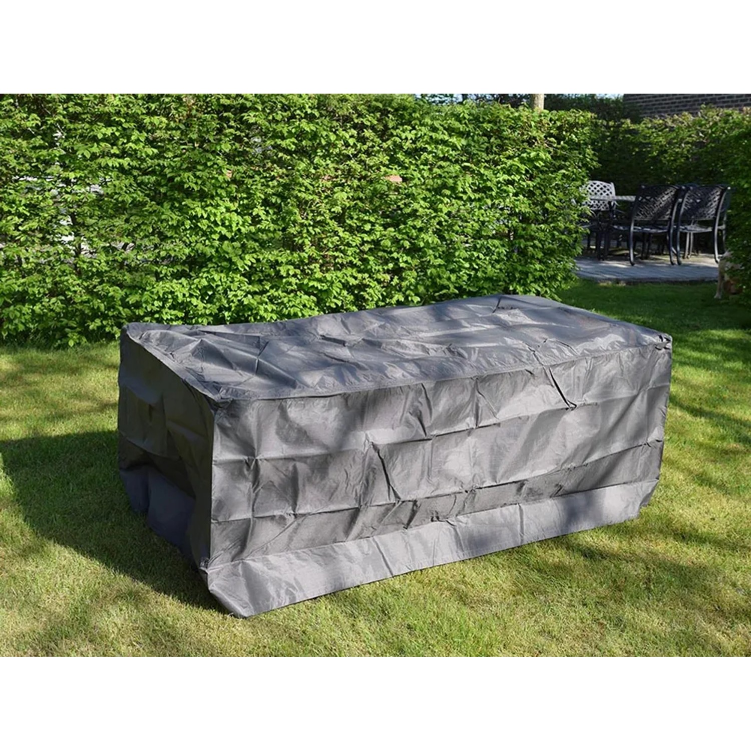 Graue Perel Schutzhülle für Gartentische bis 300 cm, aus Polypropylen-Gewebe.