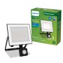 Schwarzer Philips LED-Außenstrahler mit Bewegungssensor, 5000K, 2850lm, neben Produktverpackung.
