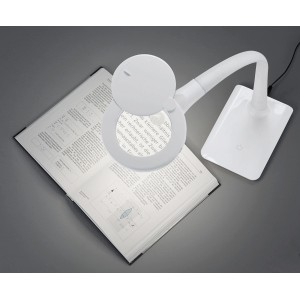 Weiße Trio LED Lupenleuchte Lupo aufgeschlagenem Buch. Schreibtischlampe mit Lupe.