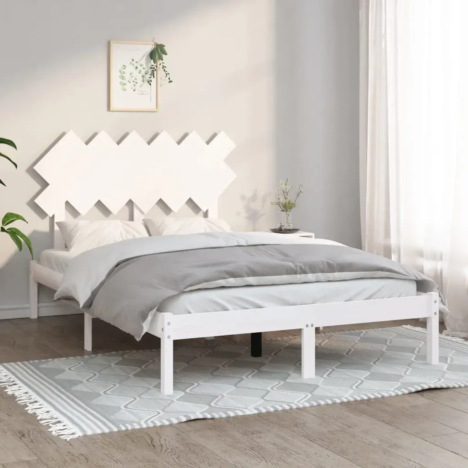 Weißes Massivholzbett 120x200 cm mit Kopfteil im modernen Schlafzimmer.