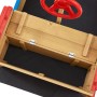 Detailaufnahme Sandkasten Käpt n Pit Piratenschiff aus Holz mit rotem Steuerrad und Bodenplane.