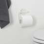 Weißer Tiger Toilettenpapierhalter Urban ohne Deckel mit Papierrolle an Wand montiert.