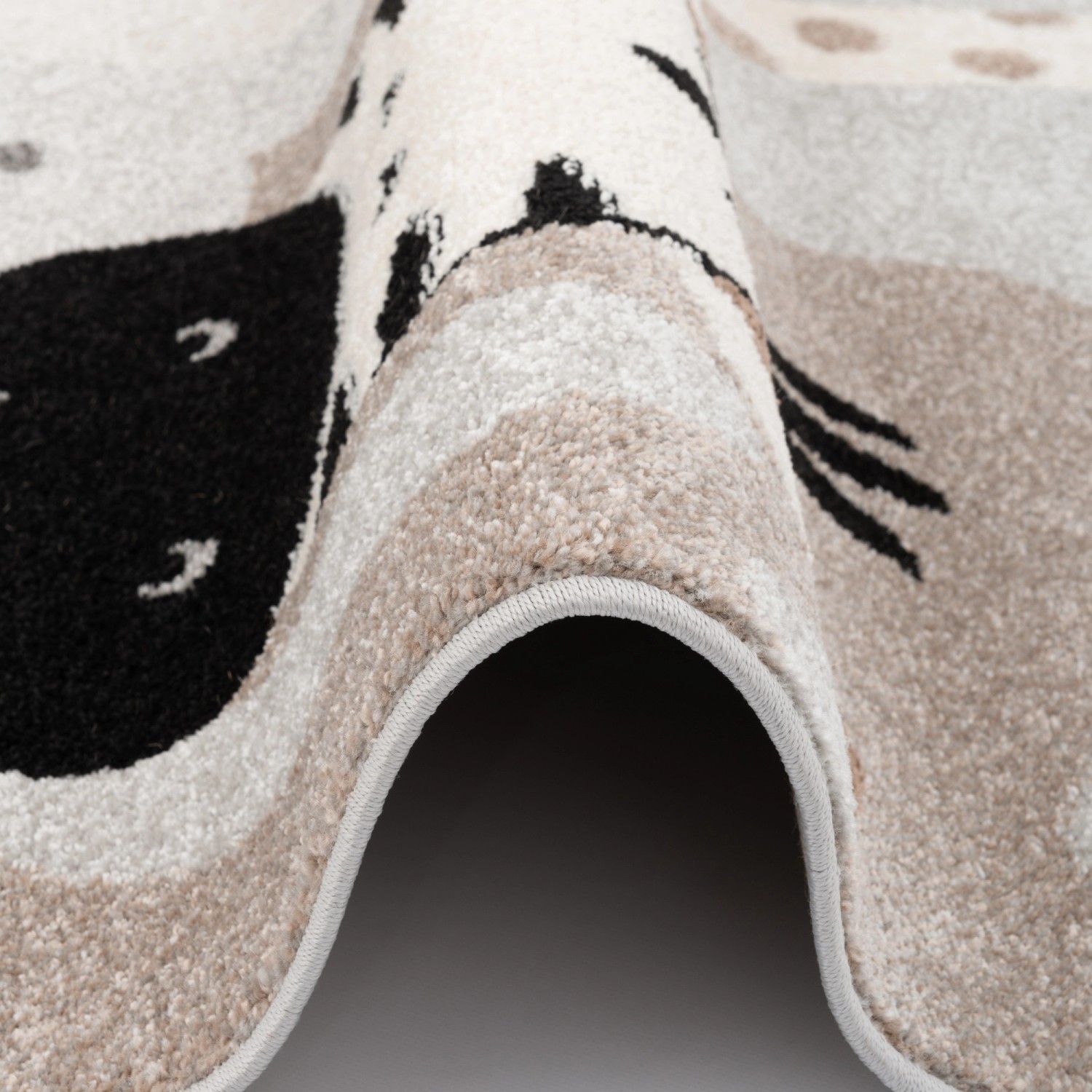 Grauer Pergamon Kinderteppich Softstar Kids Safari Friends 120x170cm, Detailansicht.