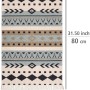 Wenko Badematte Bere aus recycelter Baumwolle mit Ethno-Muster in Beige, Blau und Schwarz.