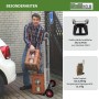 TRUTZHOLM klappbare Sackkarre aus Aluminium mit Mann beim Beladen von Getränkekisten.