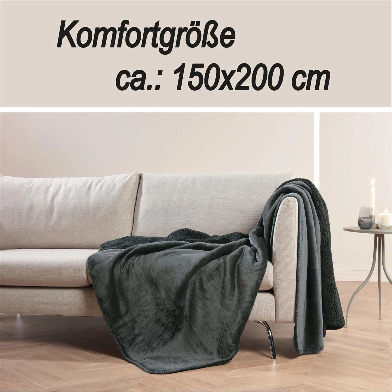 Bestlivings Kuscheldecke Teddy Fleece, 150x200 cm, schwarz auf Sofa.