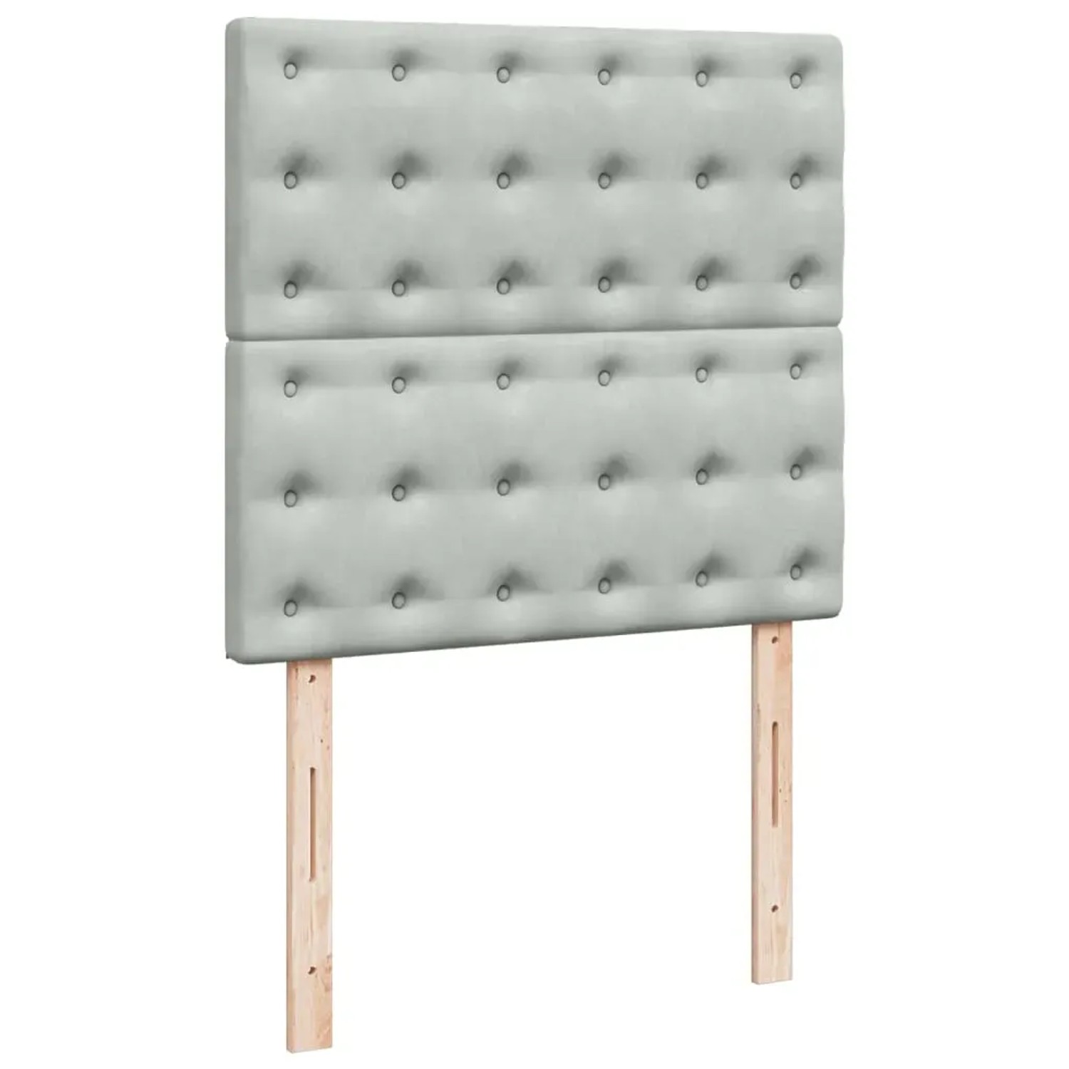 Hellgraues Boxspringbett Kopfteil aus Samt mit Knopfheftung, montiert auf Holzfüßen.
