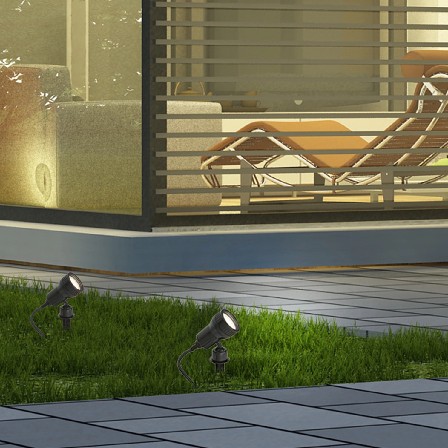 Briloner LED-Gartenstrahler mit Erdspieß, zwei schwarze Leuchten im Garten.