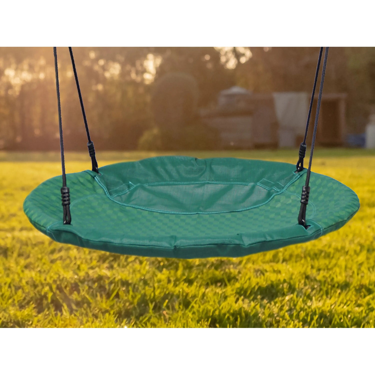 Grüne AXI Nestschaukel Summer. Runde Schaukel für Kinder zum Schaukeln im Garten.