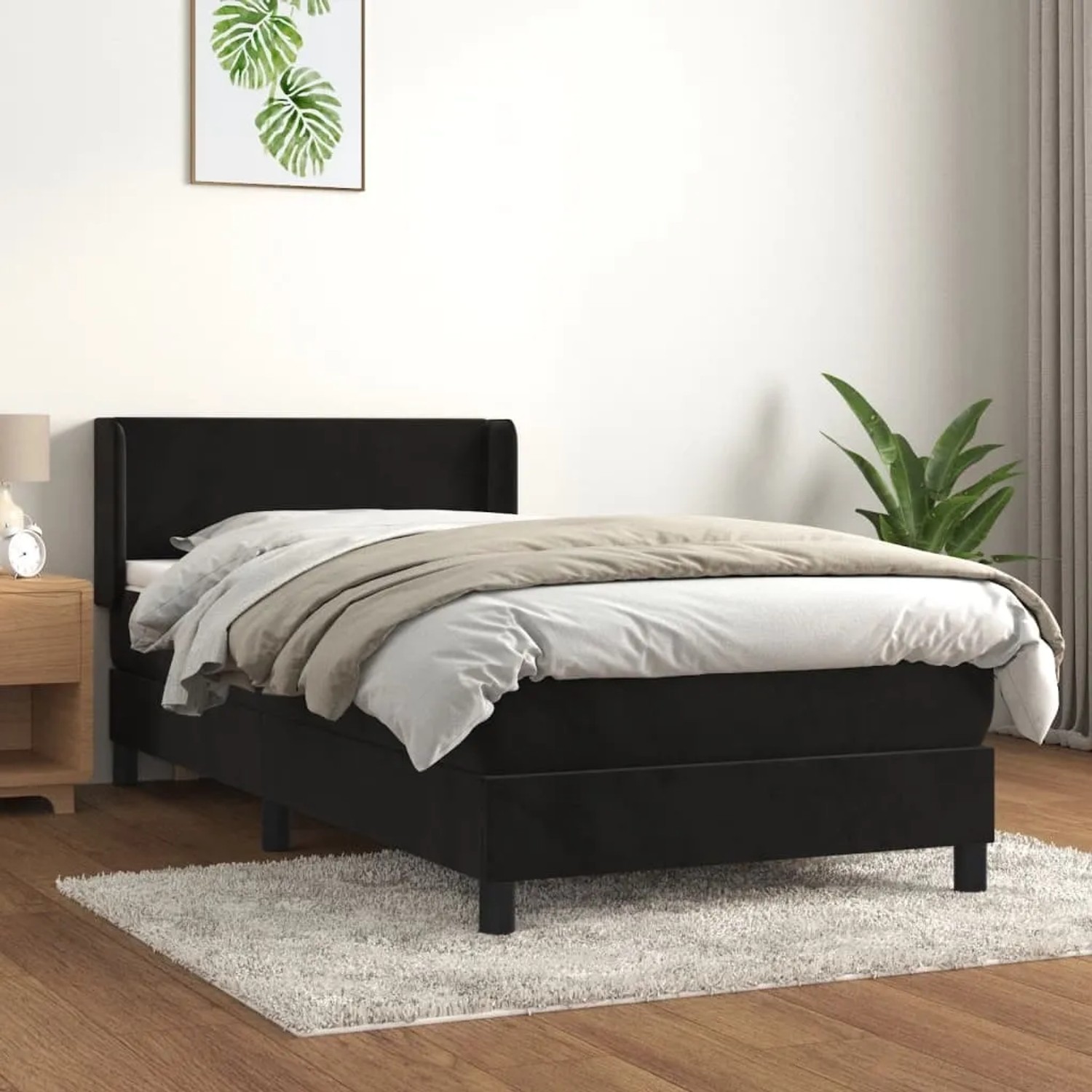 Schwarzes vidaXL Boxspringbett (80x200 cm) mit Matratze und Samtbezug.