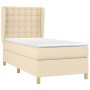 Cremefarbenes Boxspringbett 80x200 cm mit Stoffbezug, Matratze und Kopfteil. Gemütliches Bett für erholsamen Schlaf.