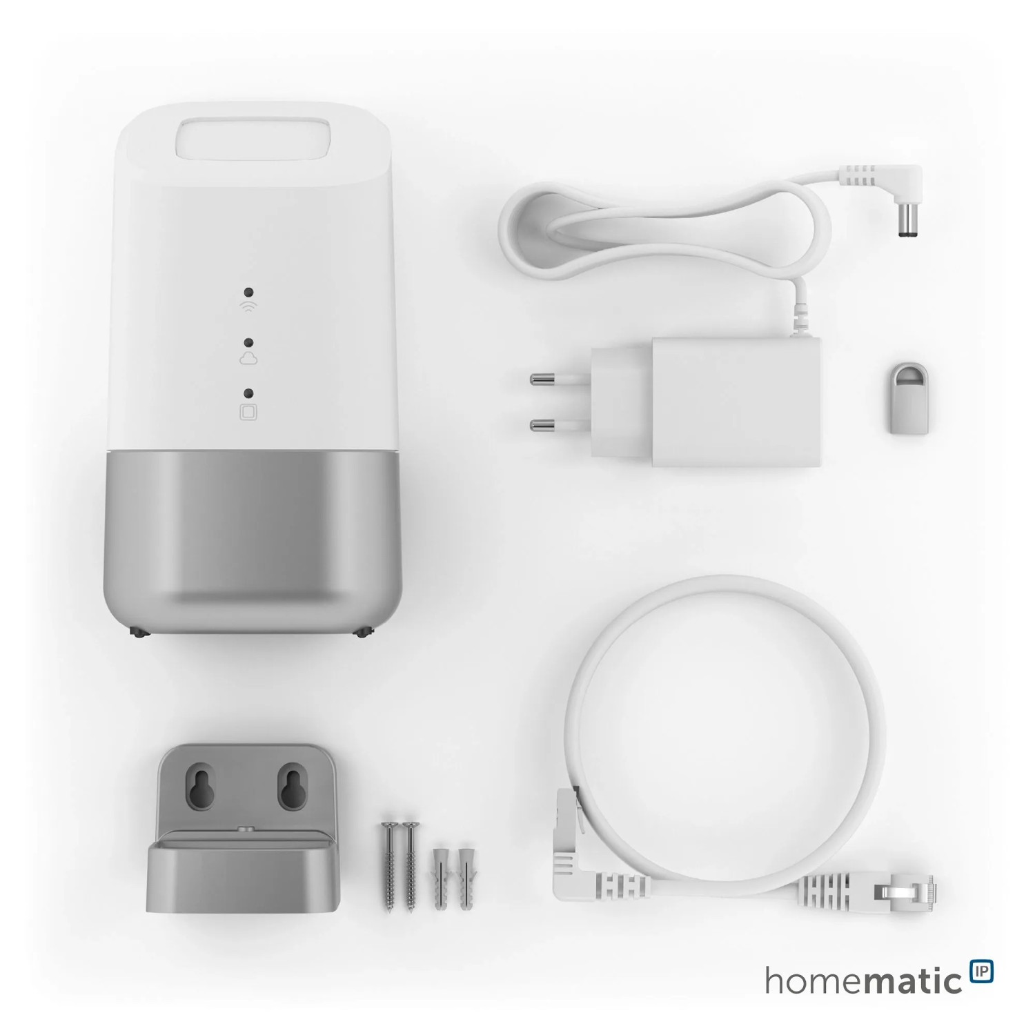 HmIP Home Control Unit: Smart Home Zentrale mit Zubehör wie Netzteil und LAN-Kabel.