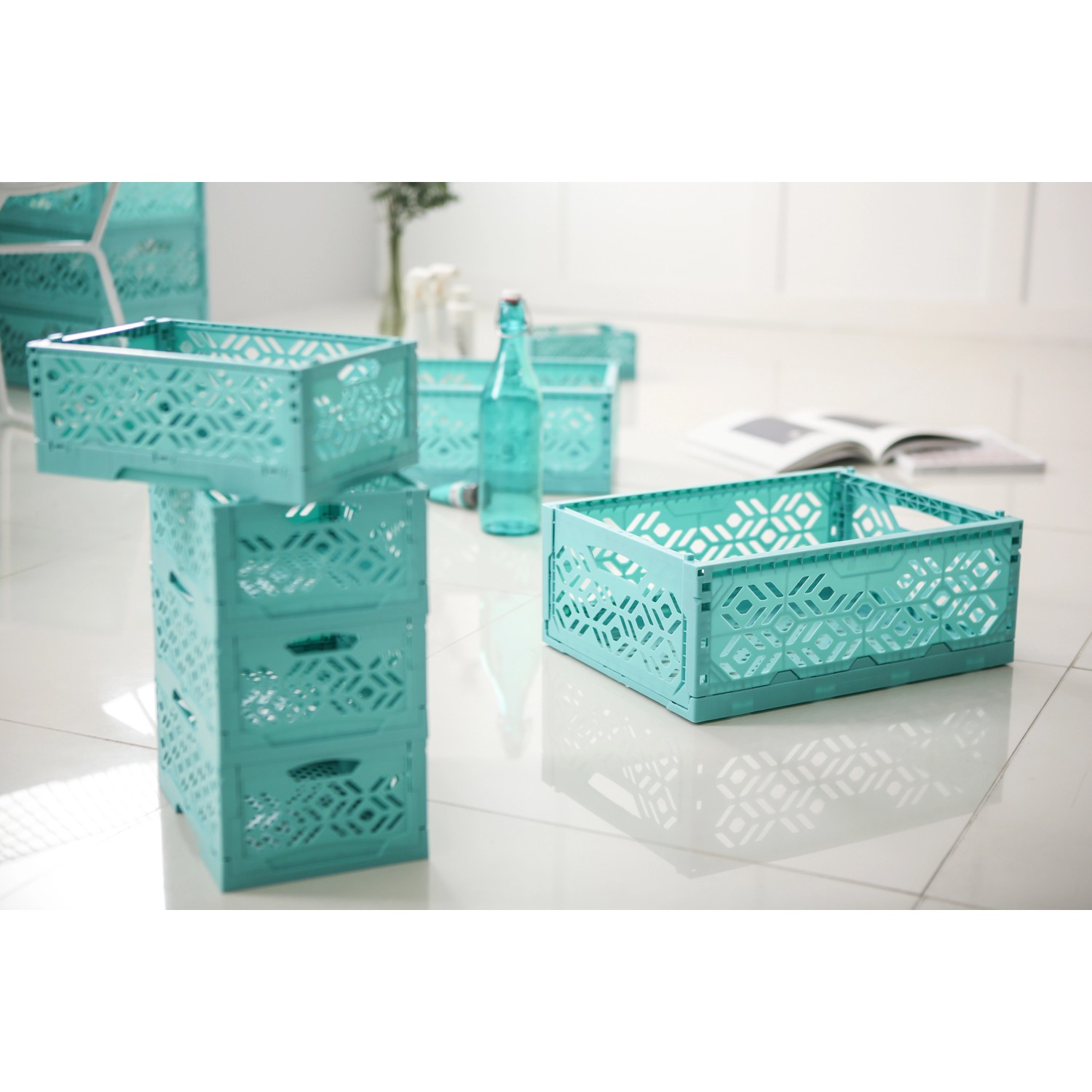 Türkisblaue Klappbox Mini: Stapelbare Aufbewahrungsbox mit Muster für Ordnung.