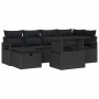 Schwarzes 7-teiliges Garten-Sofa-Set aus Poly Rattan mit Tisch und Kissen.