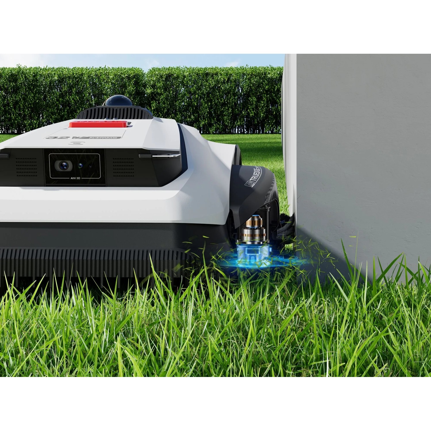 Ecovacs Goat A3000 Mähroboter beim Kantenschneiden nahe einer Mauer.