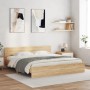 Bettgestell Sonoma-Eiche (160x200 cm) mit Kopfteil im Schlafzimmer.