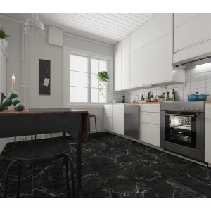 Verlegter, schwarzer Click-Vinylboden Alma Marmor in einer Küche.
