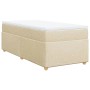 Cremefarbenes vidaXL Boxspringbett 90x190 cm mit Matratze und Auflage.