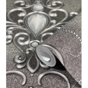 Glööckler Vliestapete mit floralen Ornamenten in Schwarz und Silber.