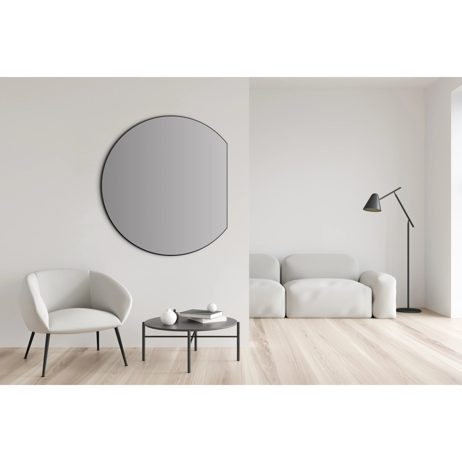 Schwarzer DSK Design-Wandspiegel Picasso, Ø 100 cm, im modernen Wohnraum.