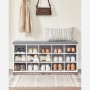 Weiße Vasagle Schuhbank mit grauem Sitzkissen und 15 Fächern für Schuhe.