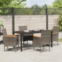 Graue 5-tlg. Garten Essgruppe aus Polyrattan mit Tisch, Stühlen und Kissen für Terrasse und Garten.