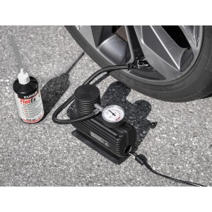 Eufab Reifenpannenset mit Kompressor und Dichtmittel am Reifen für schnelle Hilfe bei Reifenpannen.