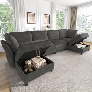 Graues Merax Ecksofa U-Form 6-Sitzer aus Chenille mit Stauraum. Offene Fächer zeigen Decke und Teddybär.