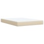 Cremefarbenes Boxspringbett 140x200 cm mit Matratze und Lattenrost.