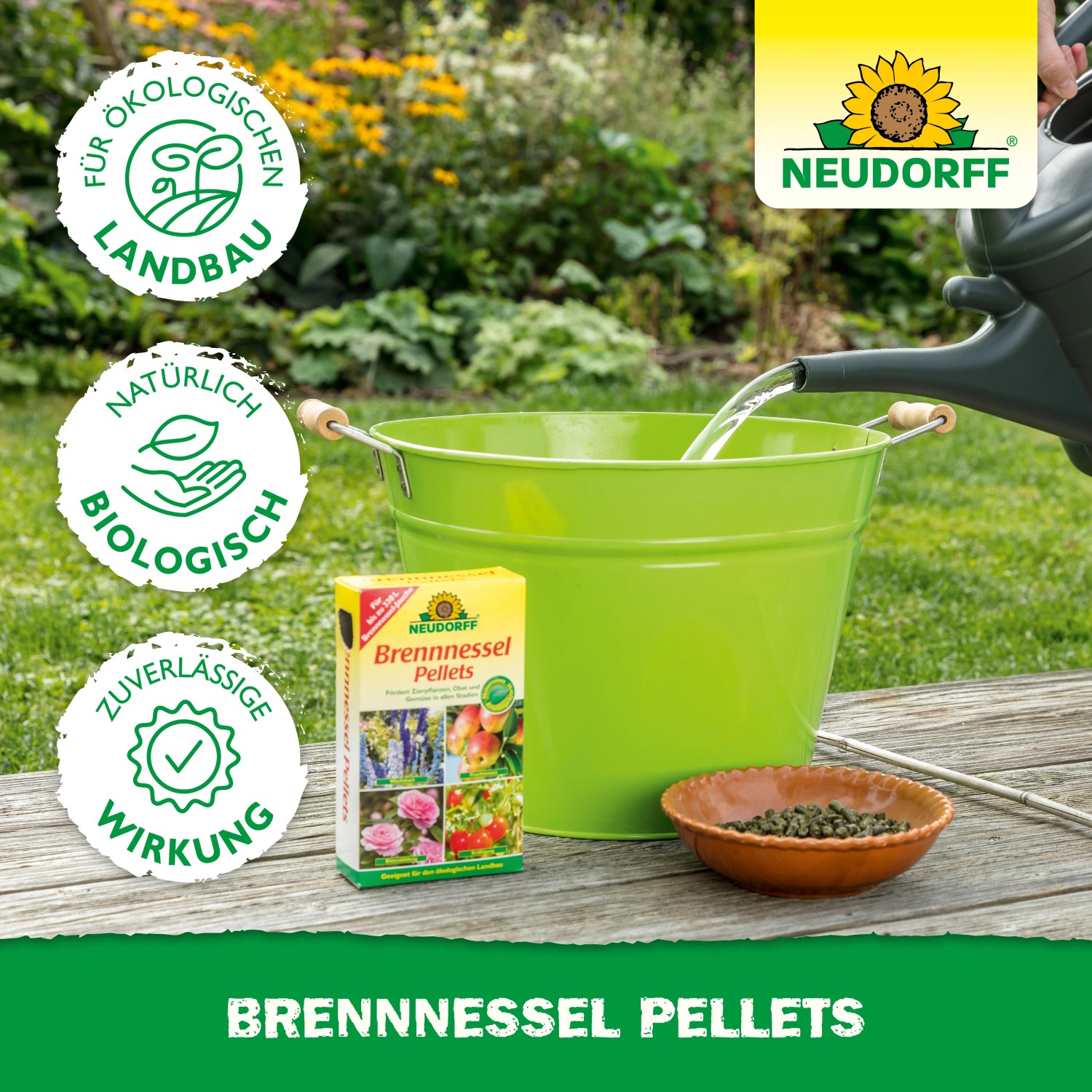 Neudorff Brennnessel Pellets 500g: Packung, grüne Pellets und Eimer mit Wasser für Pflanzenstärkung.