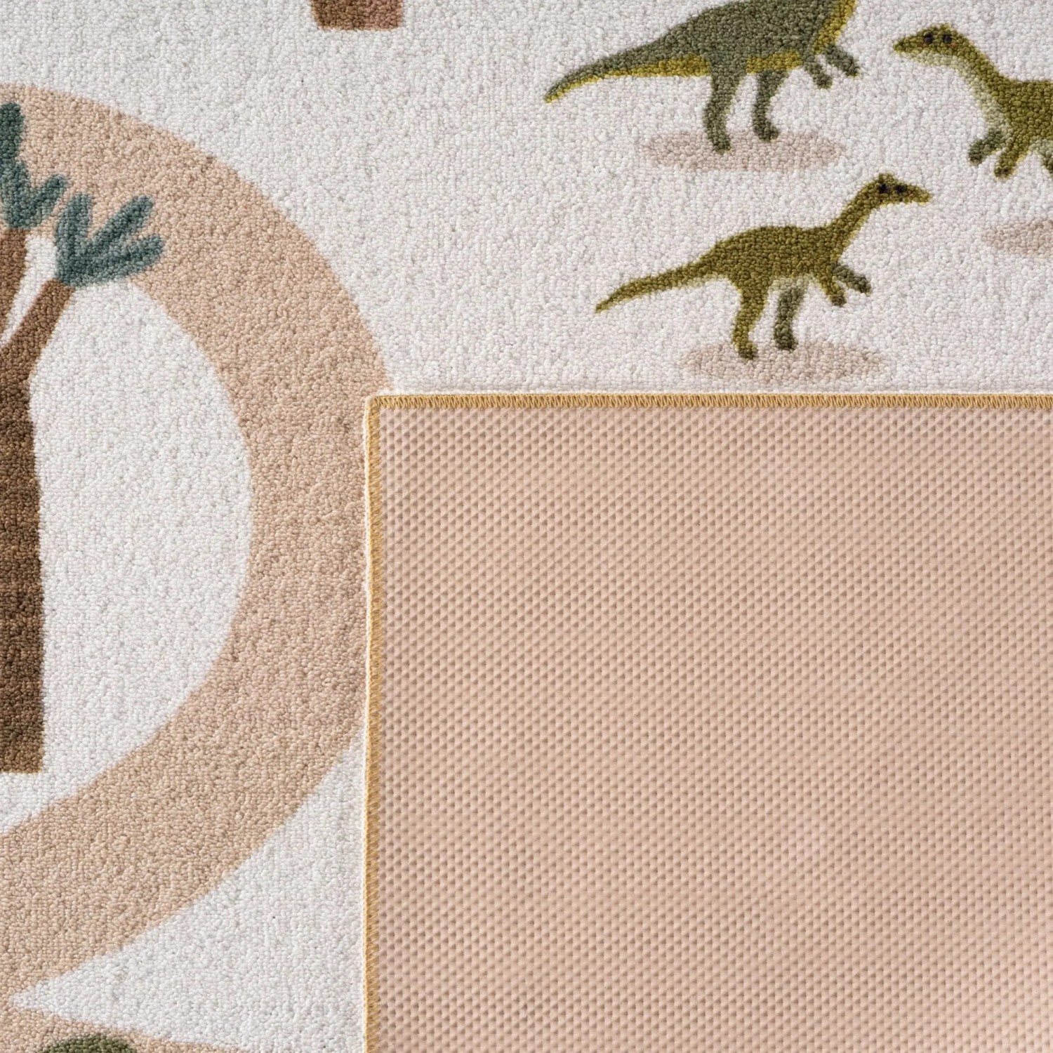 Ayyildiz Kinderteppich Coco Creme (80x150cm) mit Dinosaurier- und Baum-Motiven, rutschfeste Unterseite.