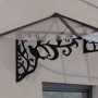 Palram-Canopia Vordach Lily XL, 3.19x0.9 m, schwarz, klare Paneele und Vogel-Design.