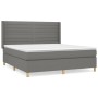 Dunkelgraues Boxspringbett 180x200 cm mit Stoffbezug und Matratze.
