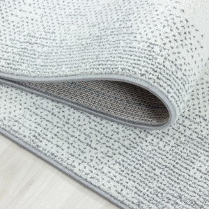 Detailansicht: Grauer Kinderteppich mit Muster, gekettelt.
