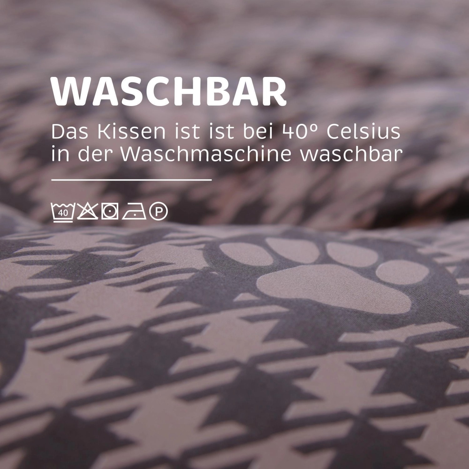 Detailaufnahme: Waschbares, braunes Hundekissen/Hundebett mit Pfotenmuster.
