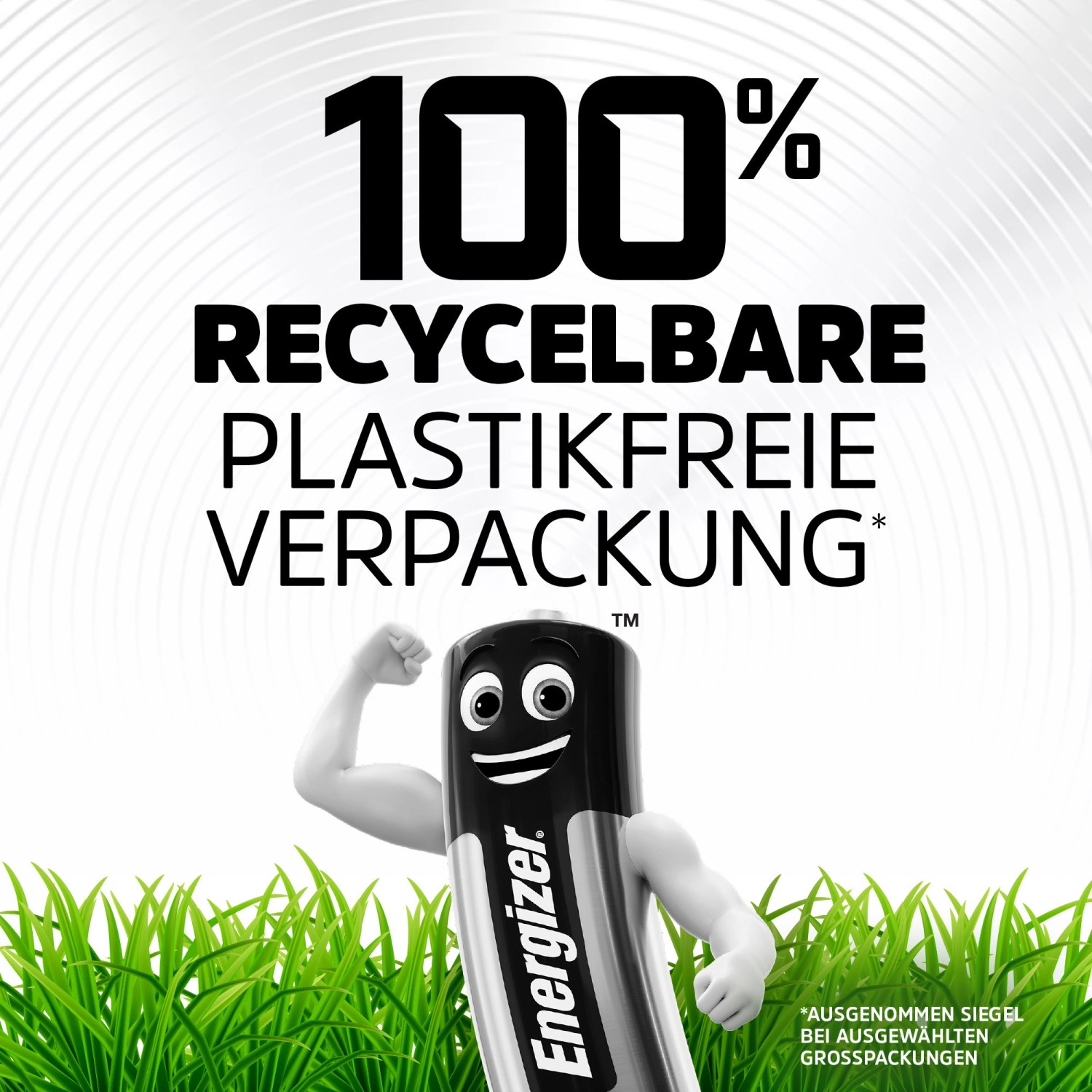 Motiv: Energizer Batterie mit Gesicht und Armen vor Gras, Text "100% recycelbare, plastikfreie Verpackung".