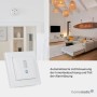 Homematic IP Bewegungsmelder, weiß, im 55er Rahmen an Wand. Erkennt Bewegung für Smart Home Lichtsteuerung & Alarm.