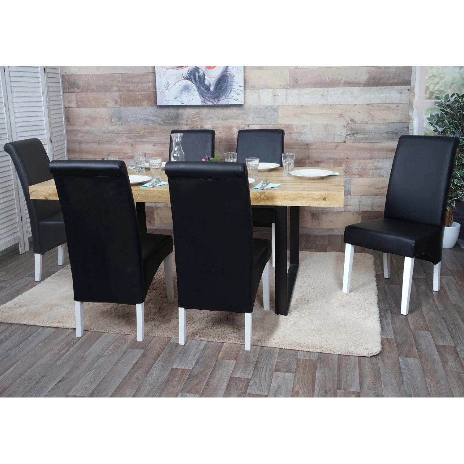 6er-Set: Schwarze MCW Esszimmerstühle M37 mit weißen Füßen am Esstisch.