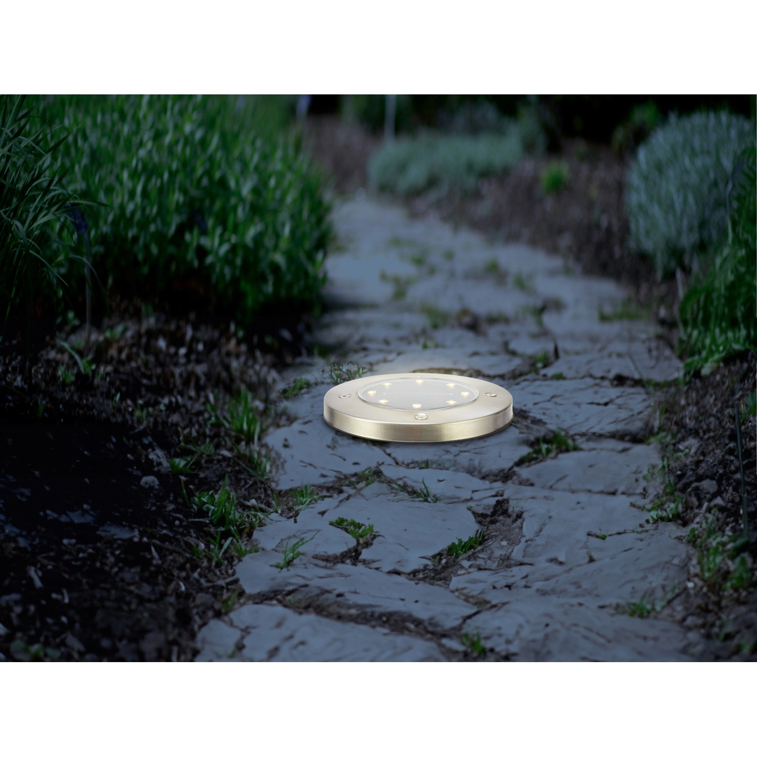 3er Set LED Solar-Bodenleuchte Faenza, Ø 11,5cm, auf Steinweg im Garten.