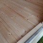 Innenansicht des weka Holz-Gartenhauses Angolo B mit naturbelassenem Holzboden.