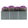 Graues vidaXL Garten-Hochbeet aus Stahl, 240x80x77 cm, bepflanzt mit lila Blumen.