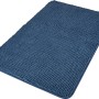 Dunkelblaue baliv Badematte (50x80 cm) aus Polyester mit Noppenstruktur.