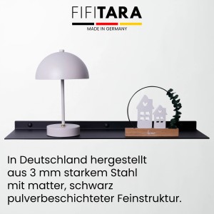 Schwarzes FIFITARA Wandregal 60cm 2er Set aus Stahl mit Deko-Elementen wie Lampe und Häusern.