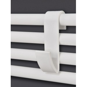 Weißer Ximax Handtuchclip aus Kunststoff am Heizkörper.